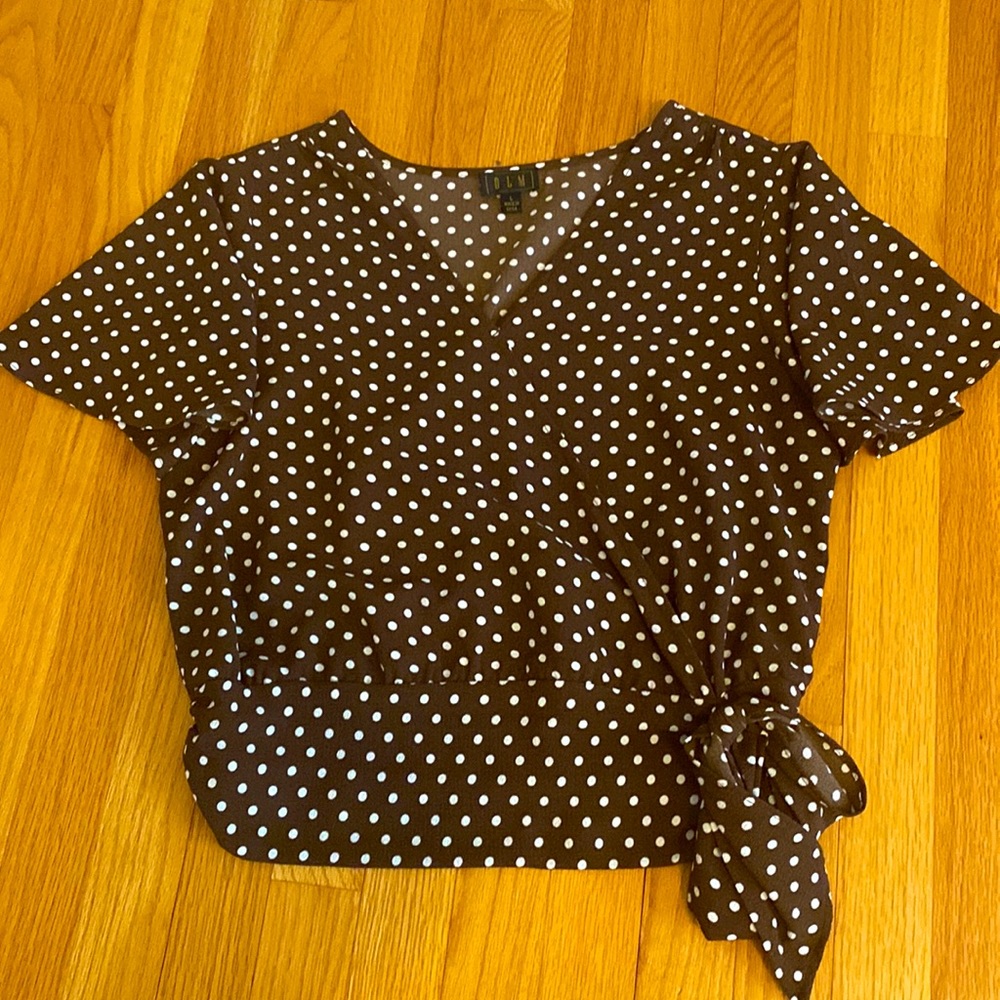Brown polka dot top.